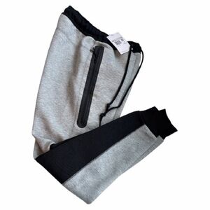 Gray and Black by Nike tech Jogger Pants